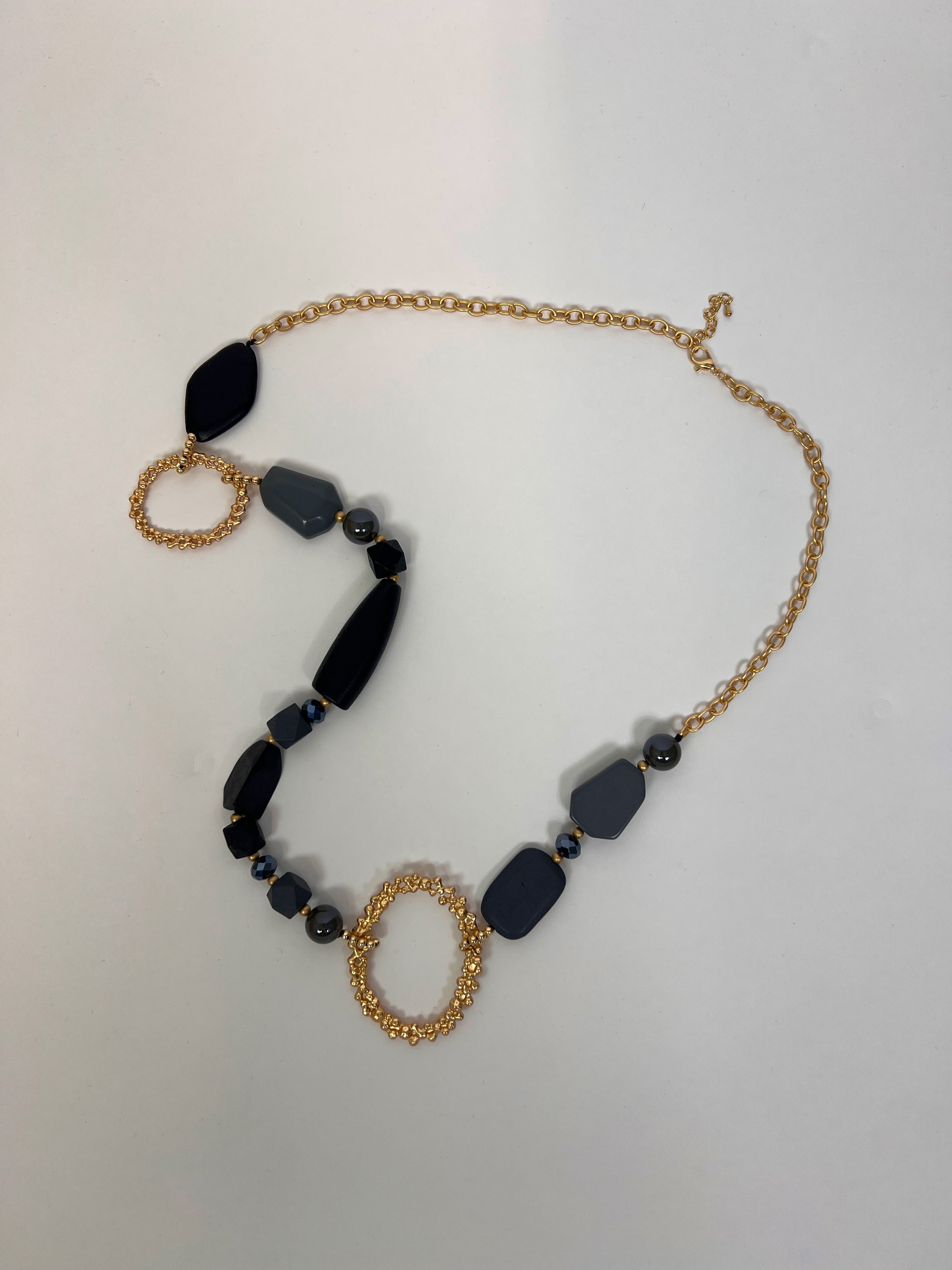 Gold Chain Necklace with Black Geometric Beads and Textured Oval Rings